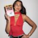 Dua Lipa hops on the strawberry red trend and pairs it with distressed denim, a key Spring 2026 crazy