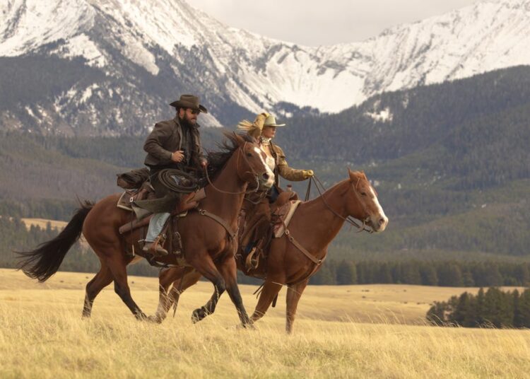 l r cole hauser as rip wheeler and kelly reilly as beth dutton in dutton ranch, episode 1, season 1, streaming on paramount, 2026 photo credit emerson millerparamount