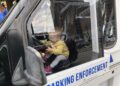 Aubrey Jannene prepares to issue parking tickets at Big Truck Day 2022. Photo by Jeramey Jannene.