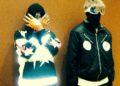 Image may contain Clothing Coat Jacket Costume Person Adult Hood Pants Hoodie Knitwear Sweater and Sweatshirt