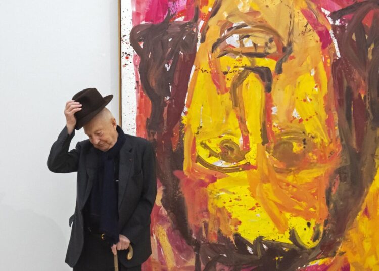 German artist Georg Baselitz poses with his work 'Schwester Rosi III' (1995) in 2018.