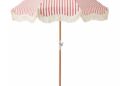 Red and white striped patio umbrella