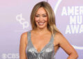 Hilary Duff Shines in Silver Gown at the 2026 AMAs, Marking Her First Appearance at the Event in 21 Years