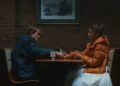 Robert Pattinson holding Zendaya's hand in The Drama. .