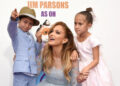 Jennifer Lopez, center, poses with twins Emme, right, and Max at the premiere of "Home" at Regency Village Theatre in Westwood, California, on March 22, 2015.