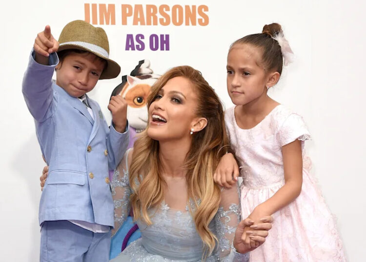 Jennifer Lopez, center, poses with twins Emme, right, and Max at the premiere of "Home" at Regency Village Theatre in Westwood, California, on March 22, 2015.
