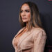 Jennifer Lopez’s Plunging Blazer Look Has Fans Looking Twice