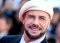 John Travolta explains headgear choice after plastic surgery rumors - Celebrity News - Entertainment