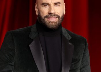 John Travolta’s Glasses, Beret Red Carpet Look at Cannes With Daughter Ella