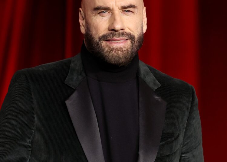 John Travolta’s Glasses, Beret Red Carpet Look at Cannes With Daughter Ella