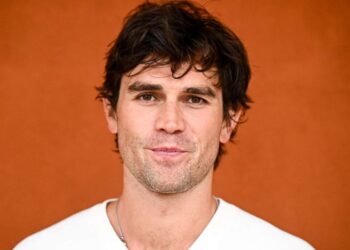 KJ Apa rocks a pair of wet undies poolside in viral new pic