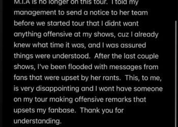 Text update from Kid Cudi about M.I.A. no longer being on tour due to offensive remarks, addressing fan concerns.