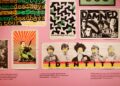 Punk posters are displayed in a museum.