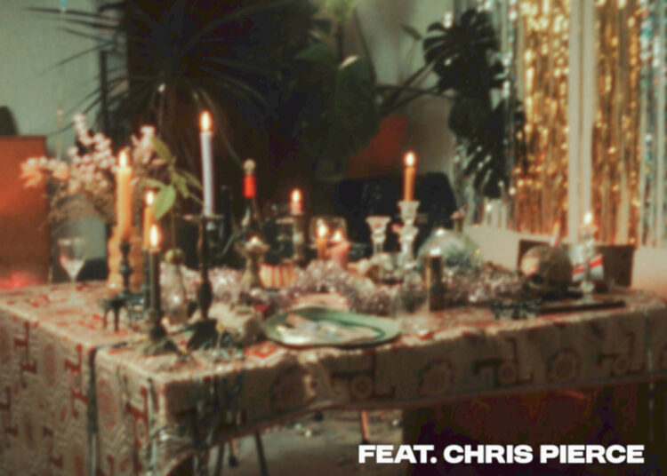 Lucy Woodward Always cover artwork. A blurry image of a table with candles, wine glasses and other objects.