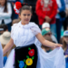 children performing a dance in traditional Mexican outfits