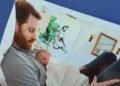 Prince Harry is pictured with baby Archie in the new picture Meghan shared