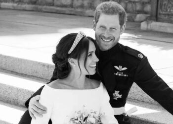 Meghan Markle and Prince Harry pose together on their wedding day in 2018. By: MEGA