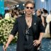 Shah Rukh Khan: Making his Met Gala debut, Shah Rukh Khan channelled dandyism in a sharp all-black Sabyasachi ensemble. A rhinestone-studded “K” pendant, layered jewellery, and a cane brought in a touch of drama, while his tousled hair, dark sunglasses, and leather boots added his unmistakable signature edge. (Image: Instagram)