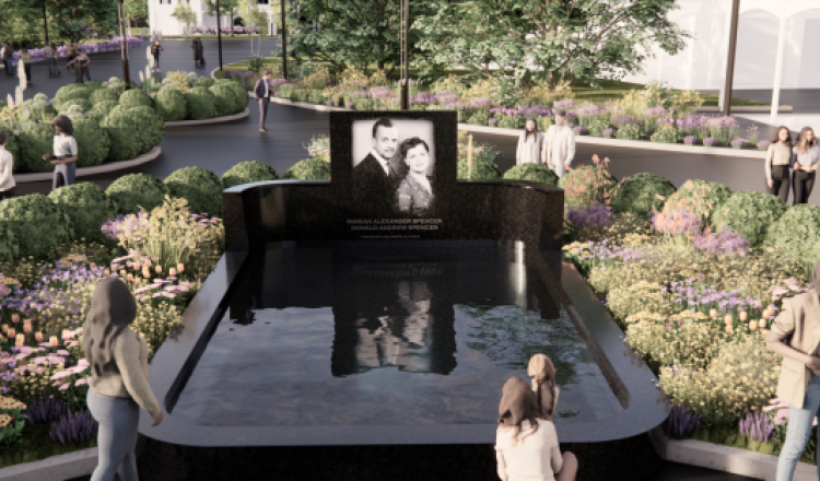 artist rendering of a black granite water fountain with a picture of a young married couple