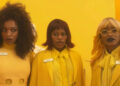 Naomi Ackie, Taylour Paige and Keke Palmer wear yellow in "I Love Boosters."