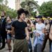 Mika Faye and Courtney Hoang dance to the music played by Ashley Jaguar at Concerts in the Park across from Sacramento City Hall on Friday.