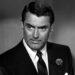 Dick Nugent wearing a black suit and tie in "The Bachelor and the Bobby-Soxer"