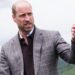 Prince William pointing at something