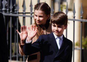 Princess Charlotte and Prince Louis waving to crowds of well-wishers (Aaron Chown/PA) (PA Wire)