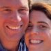 Princess Eugenie and her husband smiling on a beach