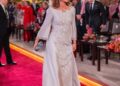 Image may contain Queen Rania of Jordan Person Fashion Adult Wedding Accessories Formal Wear and Tie