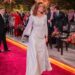Image may contain Queen Rania of Jordan Person Fashion Adult Wedding Accessories Formal Wear and Tie