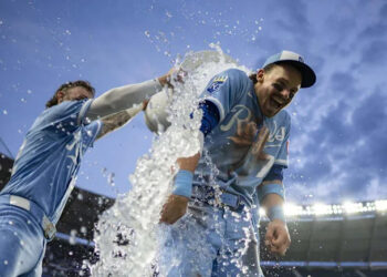 Royals superstar Bobby Witt Jr. is doused with water by teammate Carter Jensen after KC’s 5-1 defeat of the Detroit Tigers at Kauffman Stadium in Kansas City on Saturday, May 9, 2026.