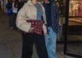 Rihanna wore the naked sandals trend with a Dior bag and camel coat
