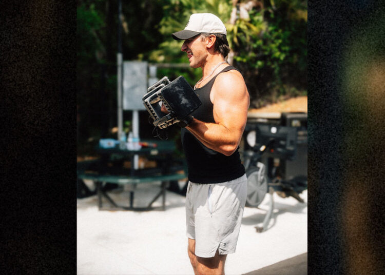 Russell Dickerson dumbbell bicep curls