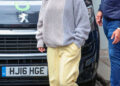 Selena Gomez proved the butter yellow trend is a summer neutral with baggy sweatpants