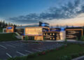 The Social at Olympia, an entertainment complex built from what was once the Olympia Resort ski hill and chalet, hopes to open its indoor attractions as early as January 2027. The four-level facility is a $22 million investment in the "play" side of Oconomowoc's development aspirations.
