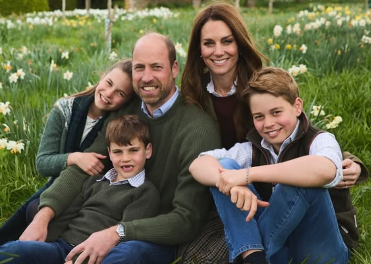 Prince William, Kate and their children sit in a field of daffodils for their Christmas card portrait