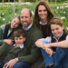 Prince William, Kate and their children sit in a field of daffodils for their Christmas card portrait