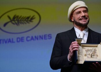 'This is beyond the Oscar': John Travolta wins surprise Cannes honourary Palme d'Or