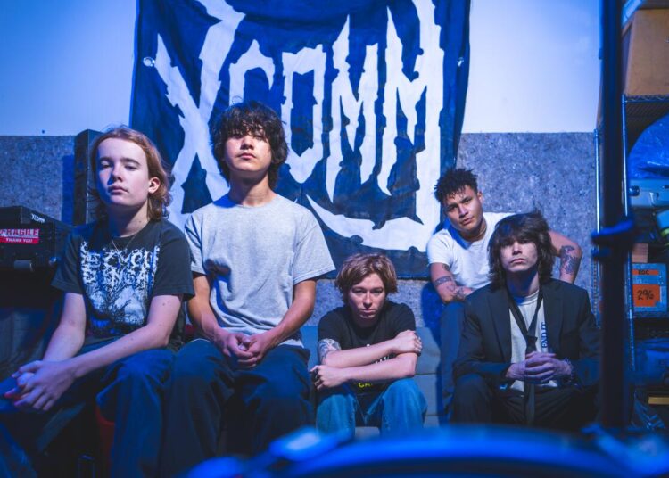 Members of the rising Los Angeles band Xcomm in their rehearsal studio in Van Nuys
