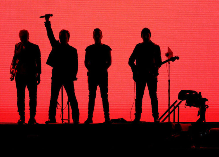 U2 members Adam Clayton, Bono, Larry Mullen Jr, and The Edge, who just performed live for the first time in almost five years, on stage on the 2017 Joshua Tree Tour.