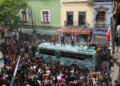 U2 fans share hopes for new album as Bono and band spotted filming new music video