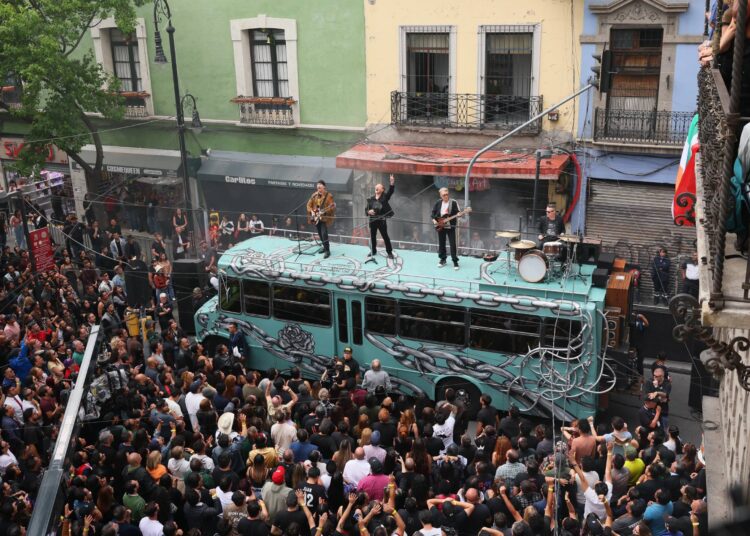 Watch U2 film video for upcoming single 'Street Of Dreams' on bus in Mexico City