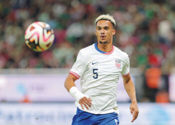 ZAPOPAN, MEXICO - OCTOBER 15: Antonee Robinson #5 of the United States runs down a ball during the first half against Mexico at Akron Stadium on October 15, 2024 in Zapopan, Mexico.