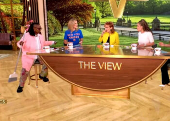 Whoopi Goldberg holds a broom on 'The View'Credit: ABC