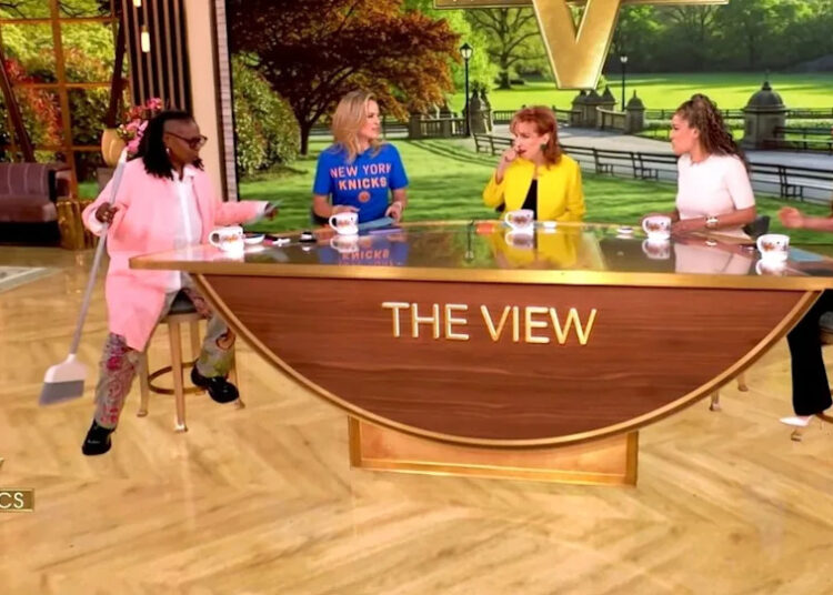 Whoopi Goldberg holds a broom on 'The View'Credit: ABC