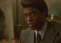 James in a grey suit and pompadour in Get On Up (2014)