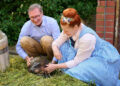 Enie van de Meiklokjes and a man crouched down with Brötchen the pygmy hippoCredit: Zoo Berlin