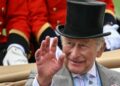 Britain's King Charles III waves as he arrives on the second day of the Royal Ascot horse racing meeting in Ascot, west of London, on June 17, 2026. (AFP)