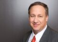 AMC Entertainment CEO Adam Aron Welcomes Paramount-WBD Merger, Citing Increased Theatrical Output